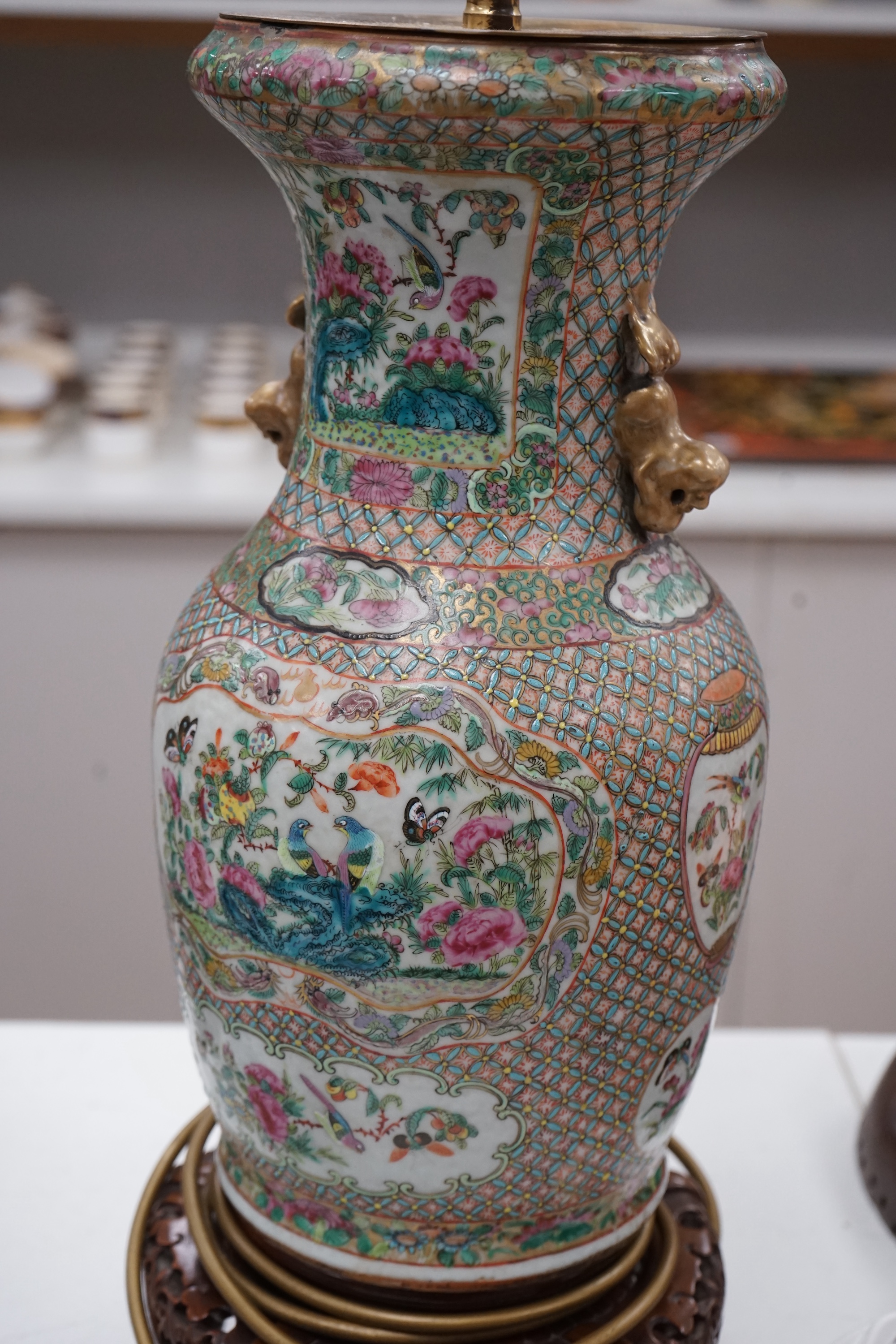 A Chinese enamelled porcelain vase, c. 1900, converted to a lamp with carves stand, 45.5cm high. Condition - good